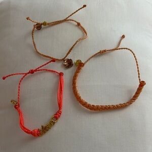 Set of Three Pura Vida Bracelets with Gold Accents